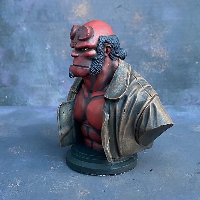 A Mantic Games bust of Hell Boy in resin with his classic manbun and brown jacket