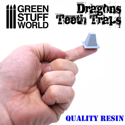 Resin Dragon Teeth Tank Traps by Green Stuff World on a finger