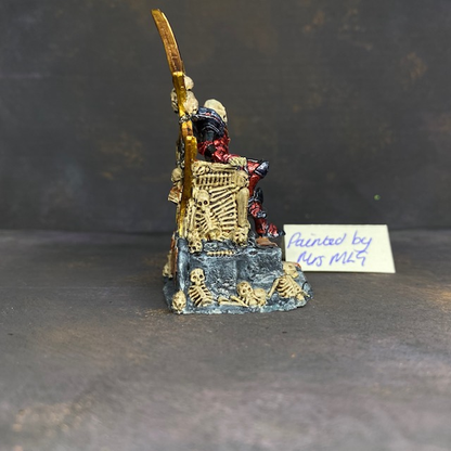 Dragoth pre painted by Mrs MLG. Dragoth sat on his throne with one hand on his sword, his throne is made from bones and skin 