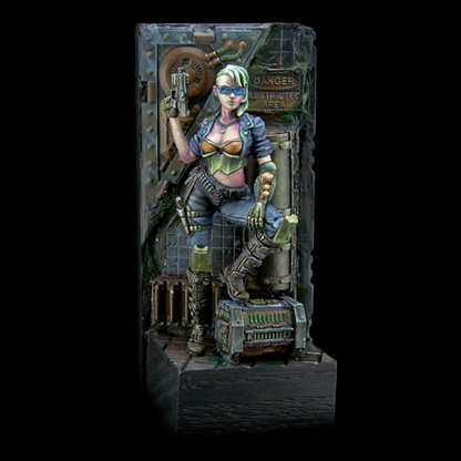 Scarlet Cyberist Dustrunner from the Chronoscope metal range by Reaper Miniatures sculpted by Gene Van Horne a 75mm scale miniature of a female cyberpunk, futuristic, pin up style figure with her leg up on a box and a pistol in one hand.