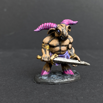 Hand painted minitaur from the Reaper Miniatures range. Mrs MLG has painted this minitaur with sword giving him bright pink horns and hooves